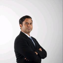 Dr. Mangesh Kamath